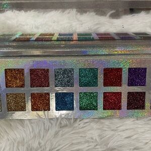The Makeup Institute.  Eyeshadow palette.  Limited edition glitter eyeshadows.